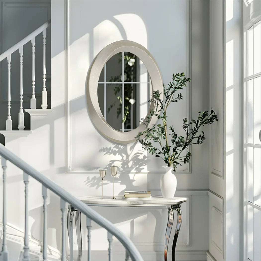 Miroir ovale baroque doré