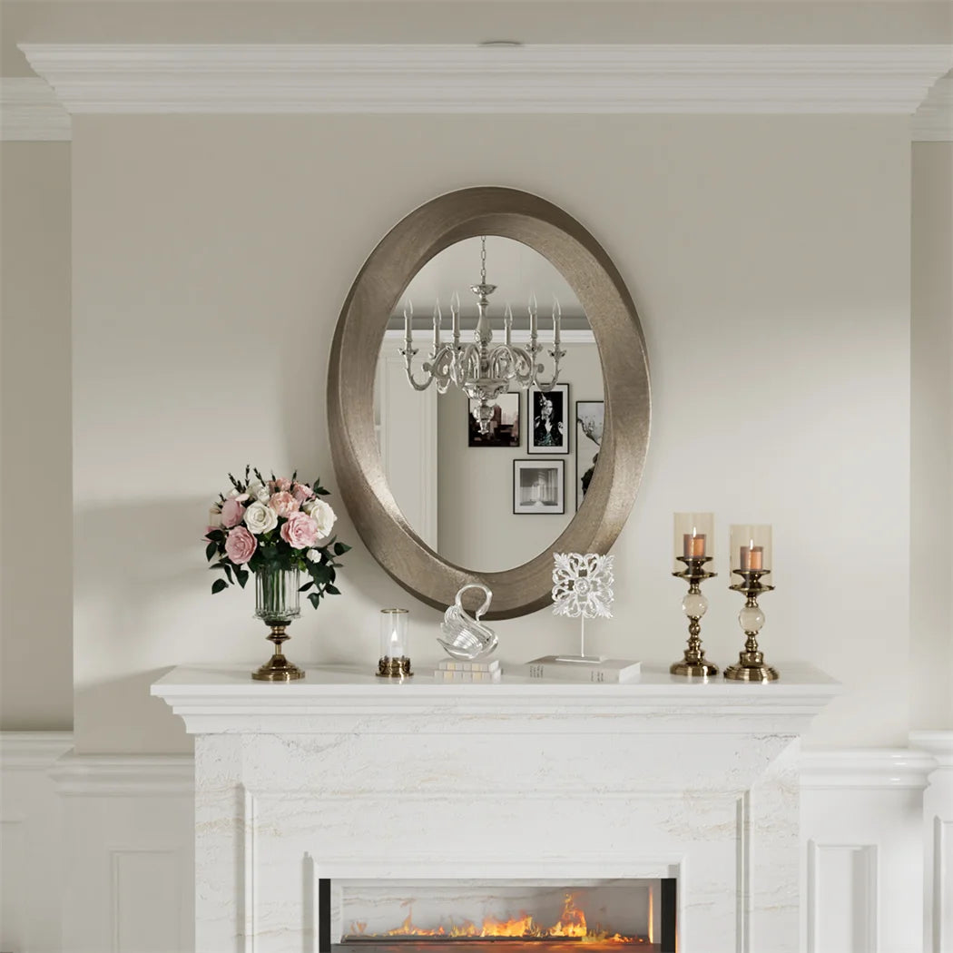 Miroir ovale baroque doré