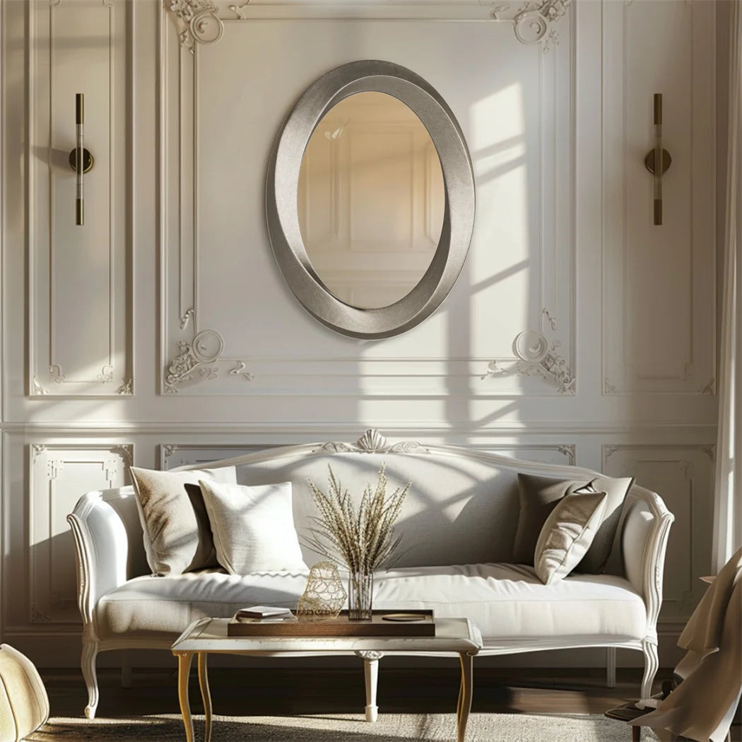 Miroir ovale baroque doré